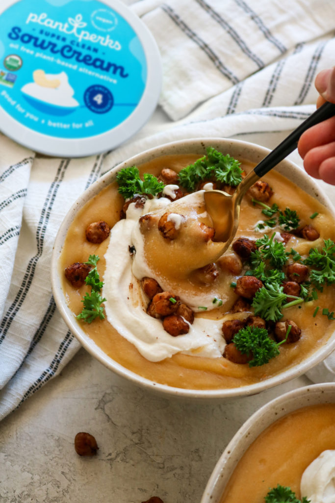 Vegan Baked Potato Soup with container of Plant Perks Vegan Sour Cream